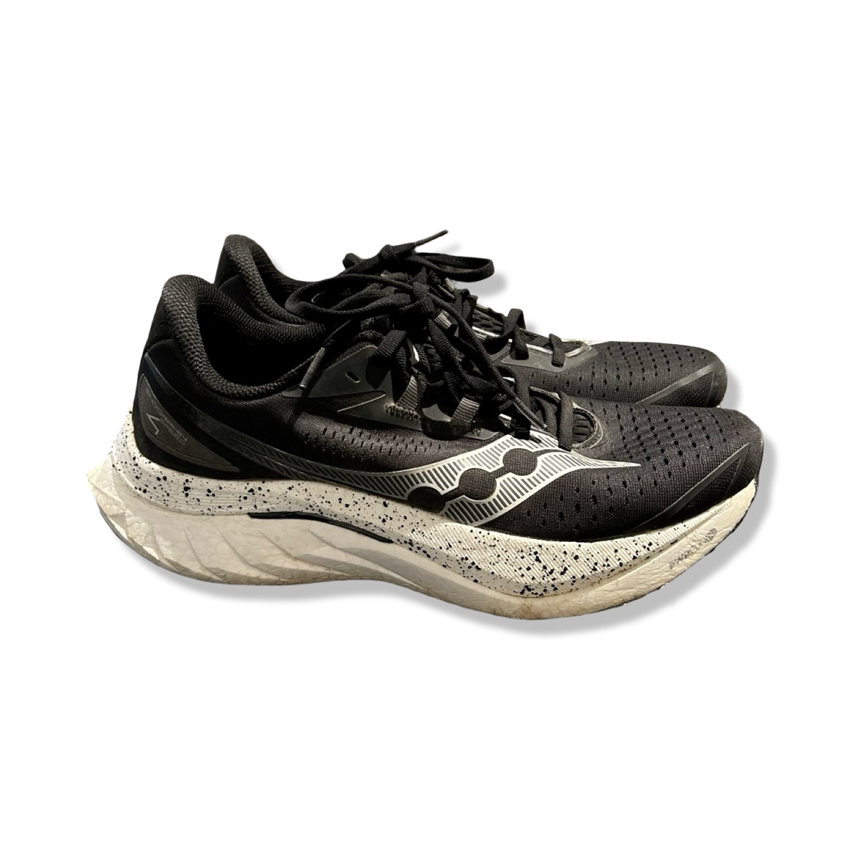 Black Saucony Endorphin Speed 4 women's running shoes, side view against a white background.
