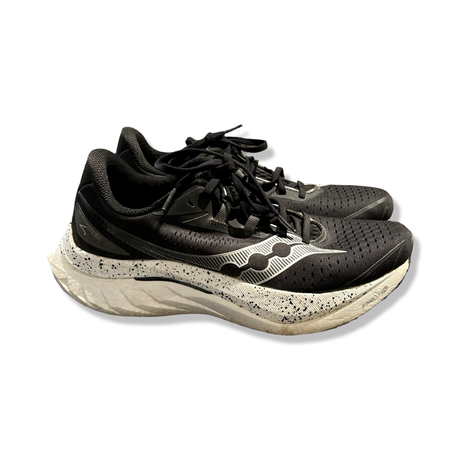 Black Saucony Endorphin Speed 4 women's running shoes, side view against a white background.