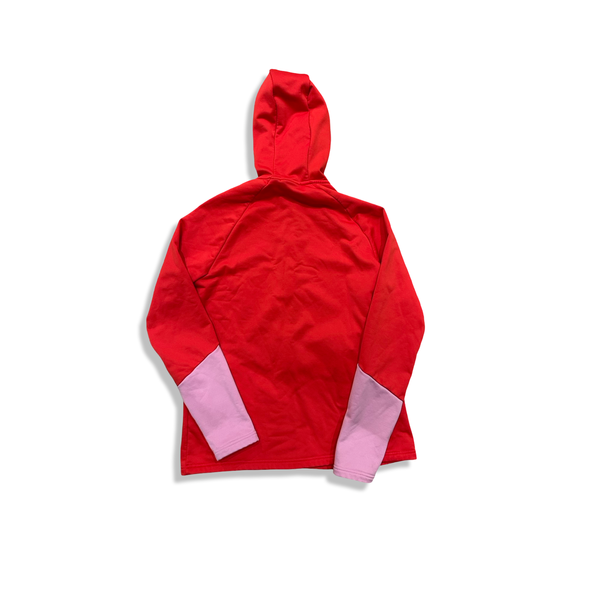 Back view of a red and pink Peak Performance women's fleece hoodie with a hood against a white background.