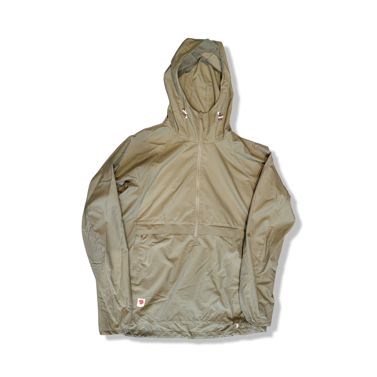 Beige anorak från Fjällräven modell High Coast Lite för dam i storlek S, fotograferad framifrån mot en vit bakgrund.
