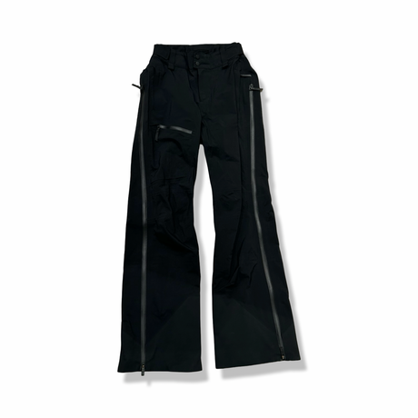 Black Peak Performance women's Gore-Tex shell pants, front view against a white background.