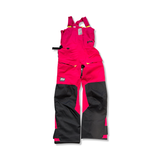 Rosa och svarta seglarbyxor från Helly Hansen i W Skagen Offshore Bib-modell för dam, visade mot vit bakgrund.