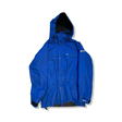 Blue Peak Performance men's RD Long 3L ski jacket with a hood, photographed from the front against a white background.