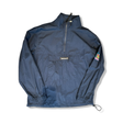 Blue Timberland men's windbreaker jacket, photographed from the front against a white background.