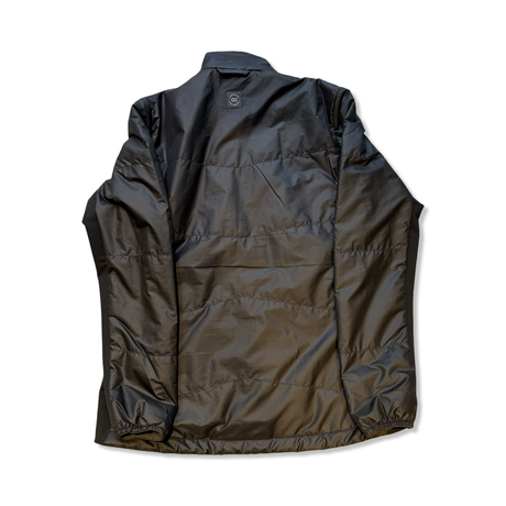 Svart damwindstopperjacka från Lundhags Skomakarna AB, modell Viik LT Ws Jacket, fotograferad bakifrån mot vit bakgrund.