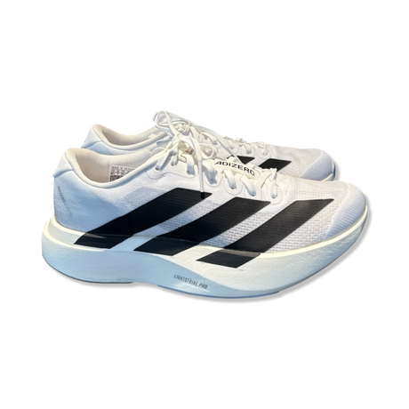 Vita Adidas adizero Evo SL W löparskor för dam med svarta detaljer och tjock sula, fotograferade från sidan.