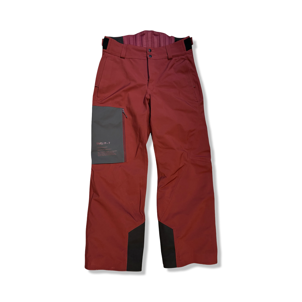Red The Mountain Studio Carv Insulated Stretch Pant men's ski pants with a leg pocket, front view against a white background.