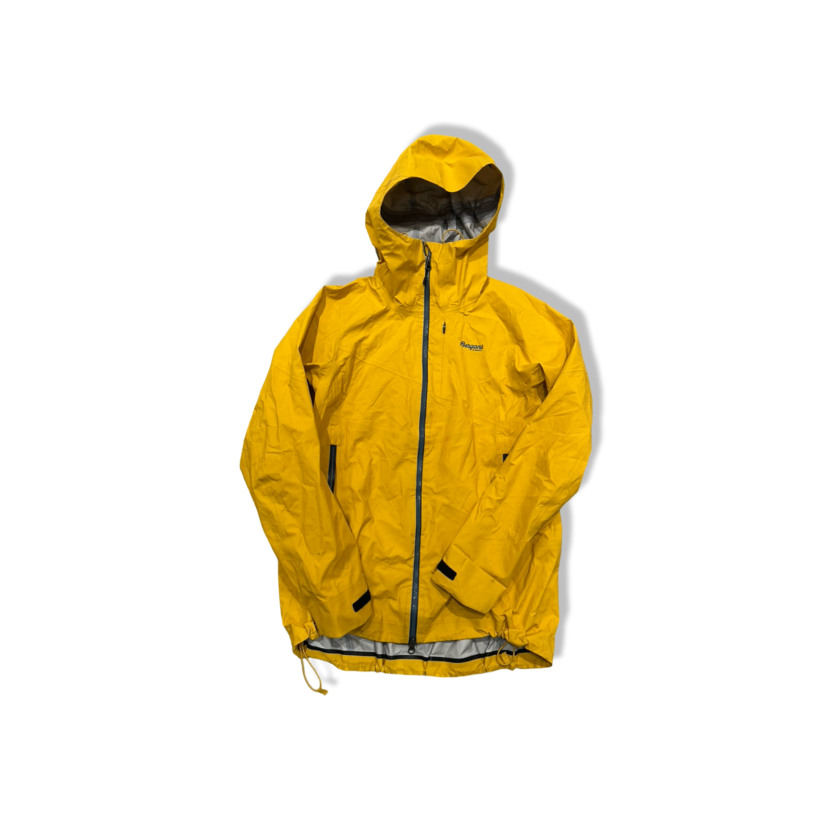 Yellow Bergans women's hooded shell jacket with zipper, front view against a light background.