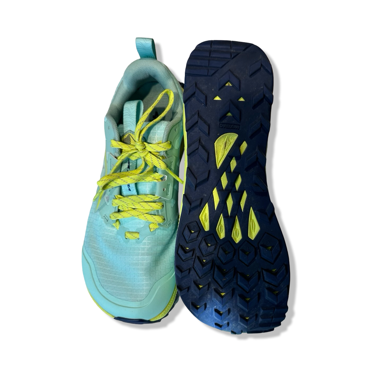 Turquoise Altra Lone Peak women's running shoes with yellow laces and a patterned sole, shown from the front and bottom against a white background.