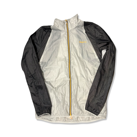 Grey and black Craft men's windstopper jacket, front view against a white background.