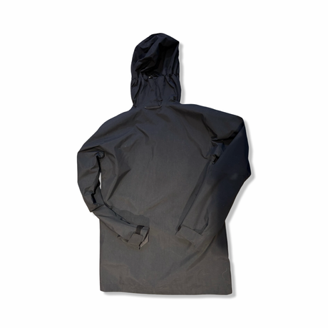 Black Haglöfs Elation GTX men's shell jacket with a hood, back view against a white background.