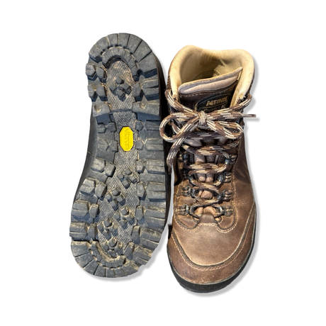 Brown Meindl women's boots with visible sole, photographed from the front and underneath against a white background.