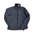 Blue Peak Performance men's synthetic jacket with high collar and zipper, front view against a white background.