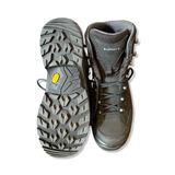 Black women's Lowa Renegade GTX Mid hiking boots, shown with one sole and the front against a white background.