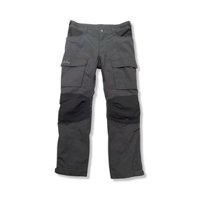 Grey Lundhags kids' hiking trousers with reinforcements on the knees and cargo pockets, front view against a white background.