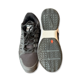 Black Nike Zoom Vapor 9.5 Tour men's training shoes, shown from above with one sole and one upper against a white background.