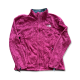 Rosa fleececardigan för dam från The North Face med dragkedja, fotograferad framifrån mot vit bakgrund.