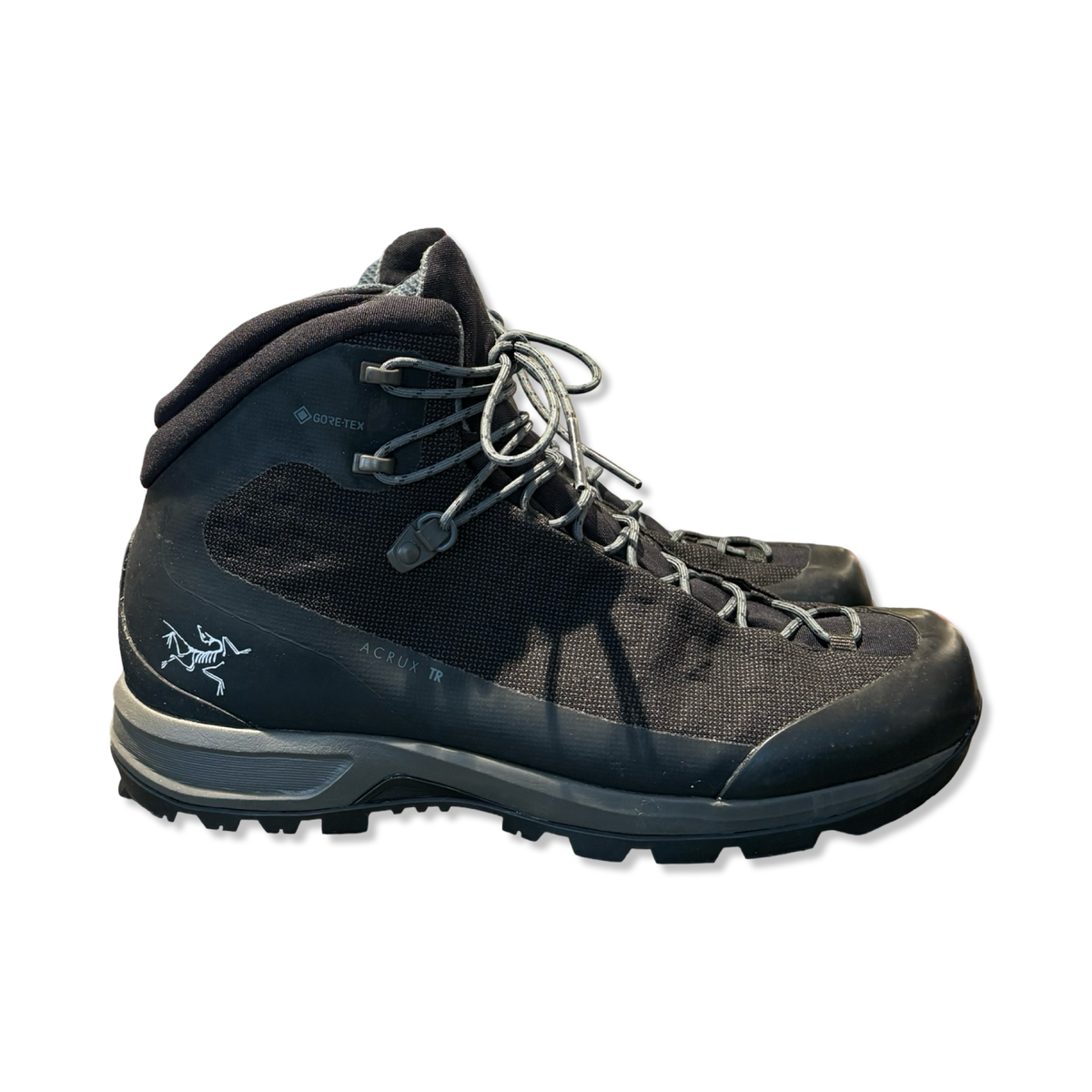 Black Arc'teryx Acrux TR GTX men's hiking boot with lacing, photographed from the side against a white background.