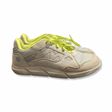 Grey Joe Nimble men's sneakers with neon yellow details and laces, side view against a white background.
