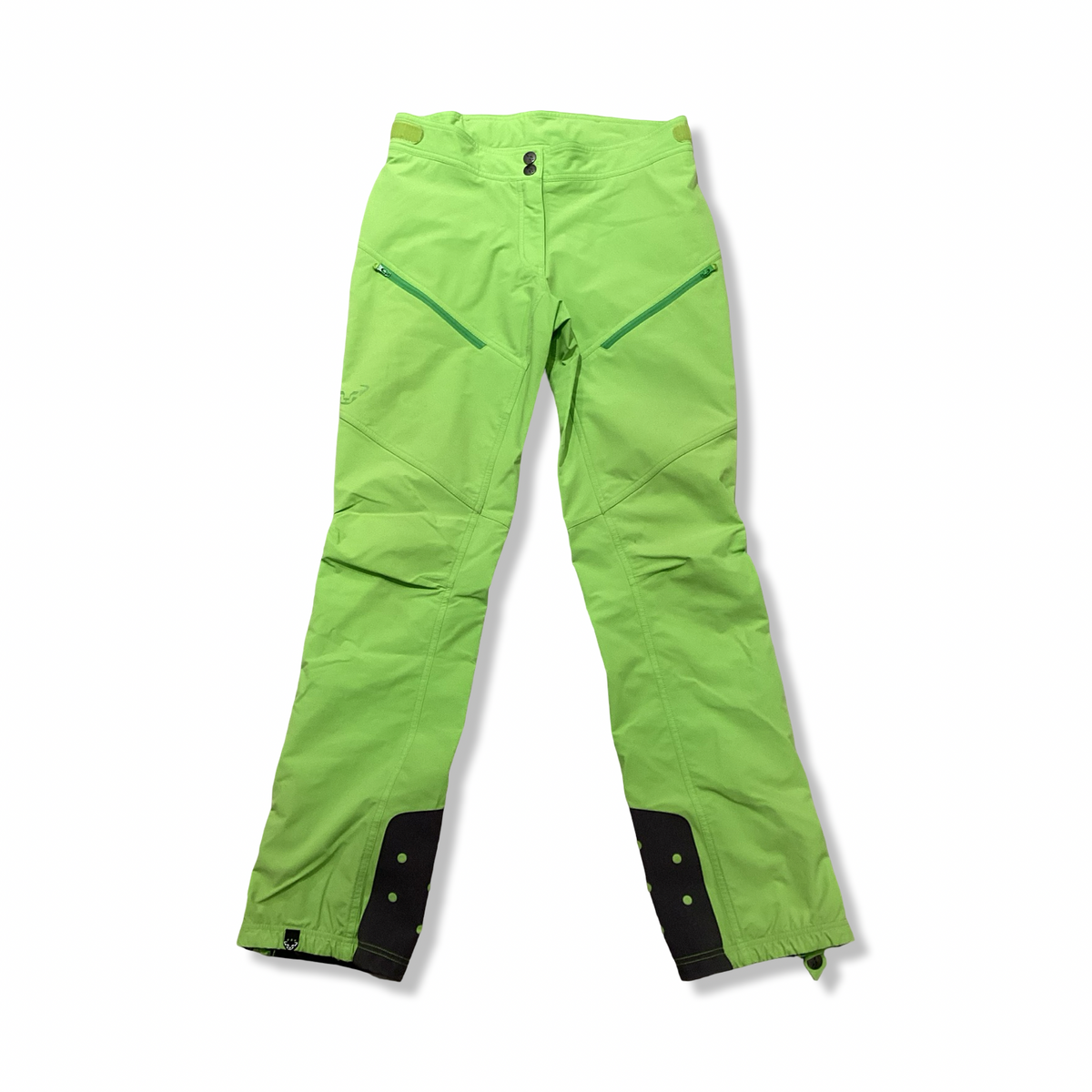 Lime green Dynafit women's softshell pants, front view against a white background.