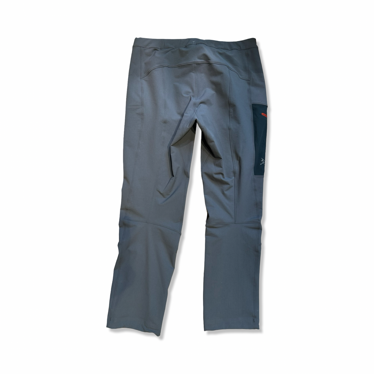 Grey Arc'teryx Gamma MX men's softshell pants, back view against a white background.