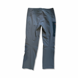 Grey Arc'teryx Gamma MX men's softshell pants, back view against a white background.