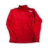 Back of a red women's softshell jacket from Helly Hansen with a white logo, photographed against a white background.