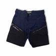 Blue Sail Racing men's sailing shorts with black reinforcements and zippered pockets, front view against a white background.