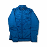 Blue Scott hybrid jacket, front view against a white background.