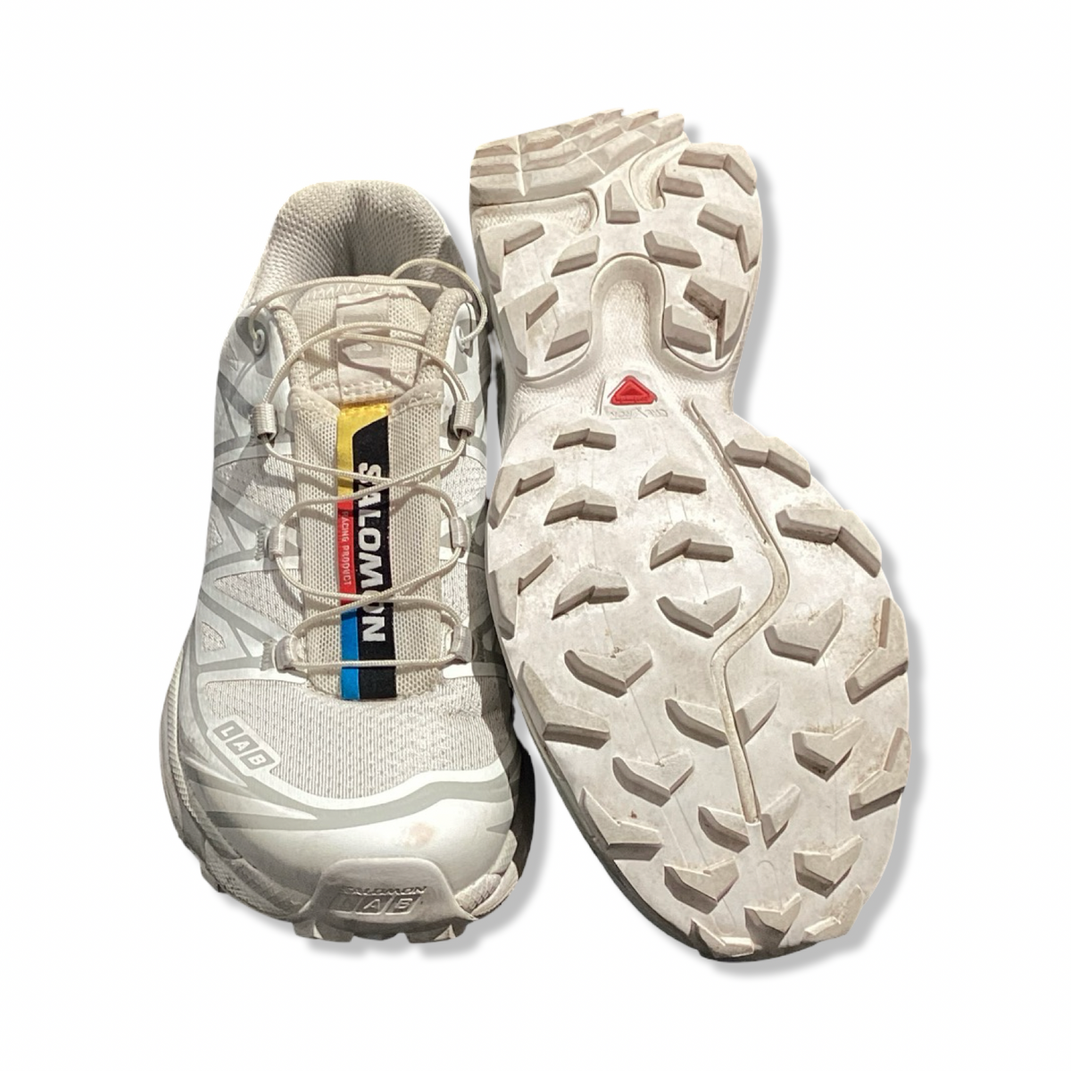 Vita löparskor Salomon LAB XT-6 för dam, visade uppifrån med fokus på ovandel och yttersula mot en vit bakgrund.