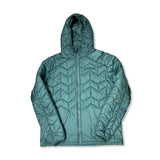 Blå/grön syntetjacka Peak Performance W Elevate Liner Hood för herr med huva, fotograferad framifrån mot en vit bakgrund.