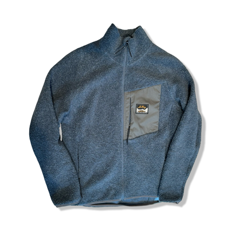 Blue women's fleece cardigan from Lundhags in fleece material with zipper, photographed from the front against a white background.