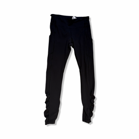 Black Lululemon women's training tights with ruching details at the leg cuffs, front view against a white background.