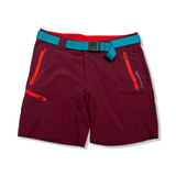 Lila vandringsshorts från Ortovox för dam med turkost bälte och orangea detaljer, fotograferade framifrån mot en vit bakgrund.