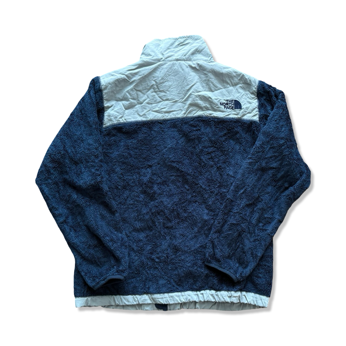 Blue and light grey The North Face women's fleece cardigan, rear view against a white background.