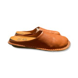 Brown leather men's slippers from Viba, side view against a white background.