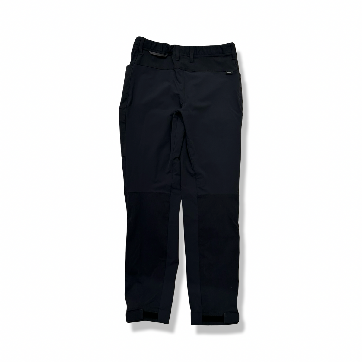 Black Haglöfs women's hiking pants, back view against a white background.