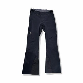 Black Peak Performance women's stretch softshell ski pants, front view against a white background.