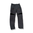 Grey Peak Performance women's shell pants, front view against a white background.