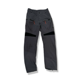 Grey Peak Performance women's shell pants, front view against a white background.