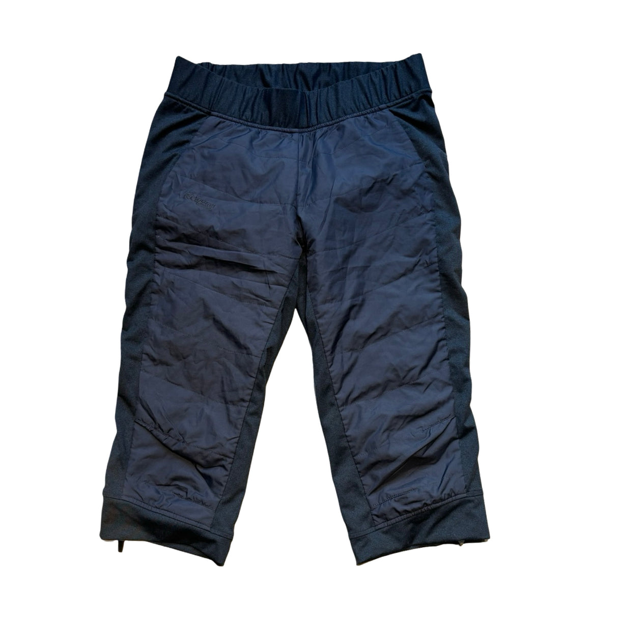 Men's blue Bergans Stranda Hybrid 3/4 hybrid pants, front view against a white background.