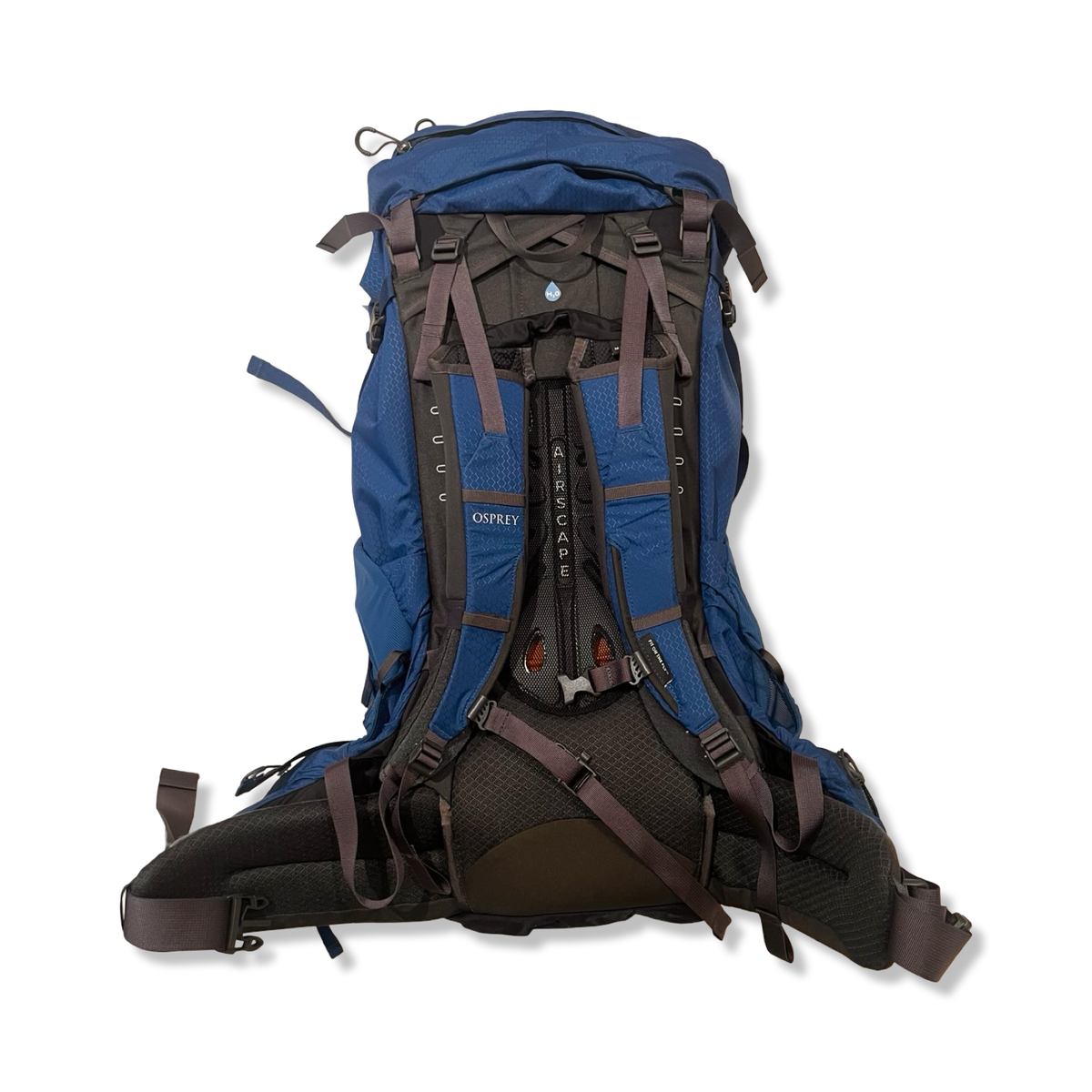Back view of a blue Osprey Aether 65 L backpack with an adjustable carry system against a white background.