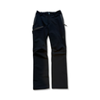 Black Haglöfs softshell pants for kids with zippered pockets, front view against a white background.
