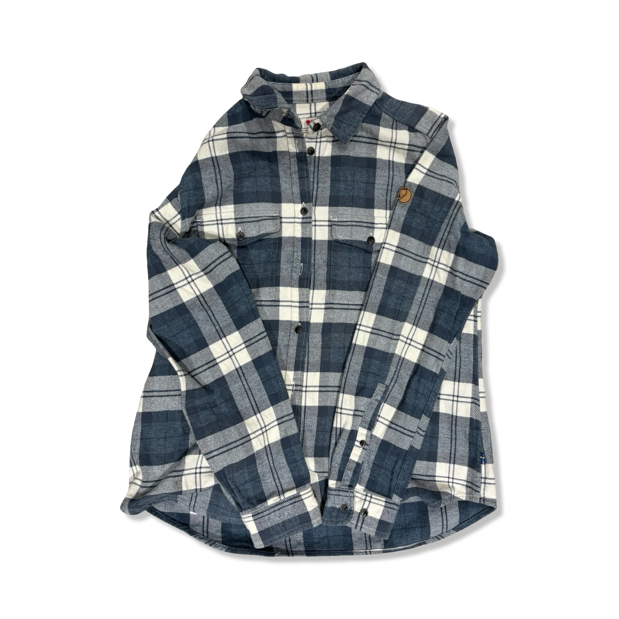 Blå och vitrutig flanellskjorta för dam från Fjällräven i modell Övik Heavy Flannel med krage och bröstfickor.