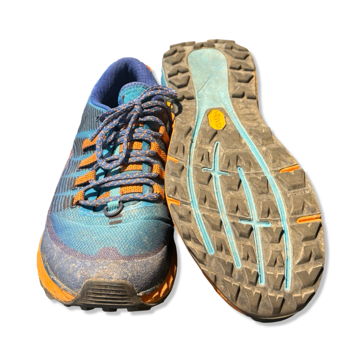 Blue and orange Merrell Agility Peak 4 Tahoe men's trail running shoes, with one shoe showing the rugged outsole.