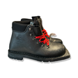 Black Alico women's ski boot with red laces, side view against a white background.