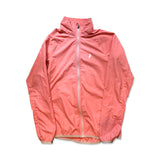 Apricot Peak Performance women's training jacket with a high collar and full zipper on a white background.