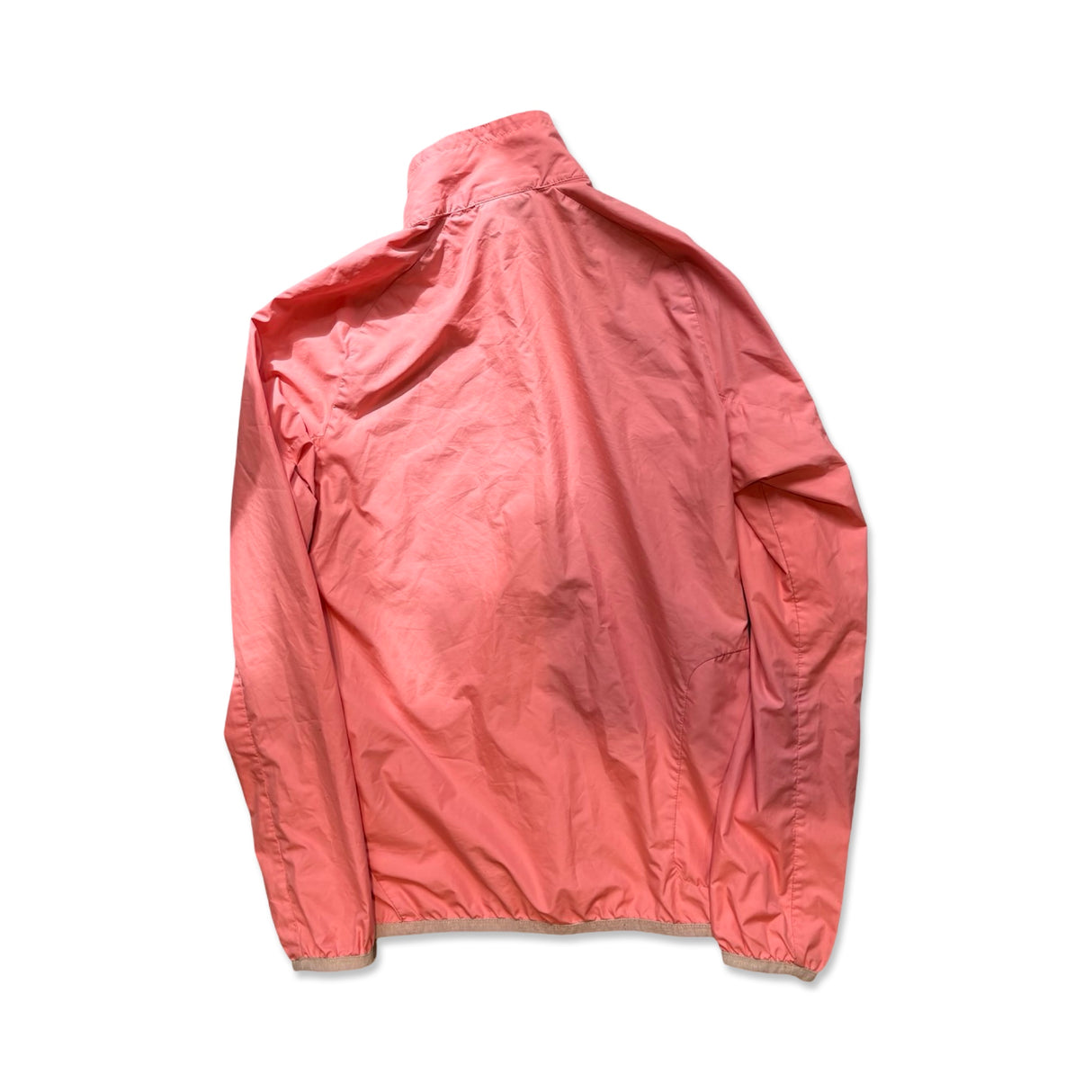 Apricot Peak Performance women's training jacket, back view against a white background.