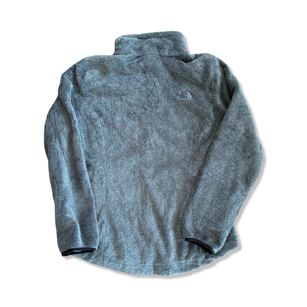 Women's grey The North Face fuzzy fleece sweater, back view against a white background.