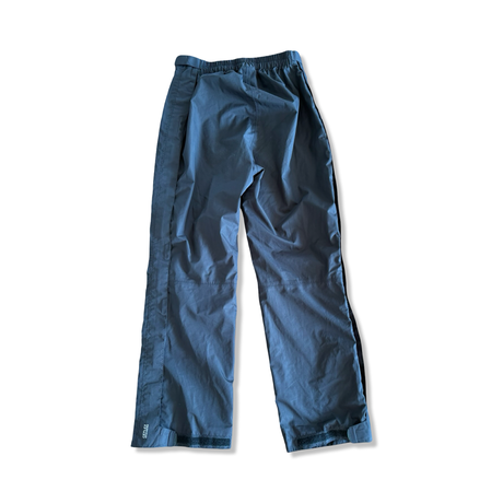 Men's black Vaude Ceplex rain pants, back view against a white background.